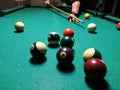 Cue aim billiard snooker pyramid on green table. A Set of snookers/pool balls on Billiards table. Royalty Free Stock Photo