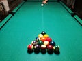 Cue aim billiard snooker pyramid on green table. A Set of snookers/pool balls on Billiards table. Royalty Free Stock Photo