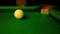 The cue ball left on the Board next to the billiard pocket