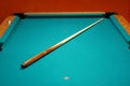 Cue stick on a pool table