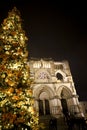 Cuenca Cathedral facade on a foggy night at Christmas time