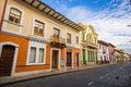 Cuenca, Ecuador - April 22, 2015: Bridgestone roads in city centre with charming and beautiful buildings architecture, small