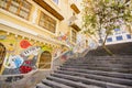 Cuenca, Ecuador - April 22, 2015: Charming concrete staircase with urban art and graffiti connecting city streets Royalty Free Stock Photo