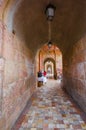 Cuenca, Ecuador - April 22, 2015: Walking tunnel paths and marketplaces located alongisde facade of main cathedral, very