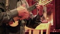 Cuenca, Ecuador - 20161116 - Closeup of Man Demonstrating Mastery of Charango.