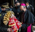 cuenca, Ecuador, Dec 24, 2021 - Catholic Bishop receives Baby Jesus statue in the traditional Traveling Child Pase del