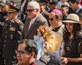 Mayor and Bishop of Cuenca carry a statue of Baby Jesus during p