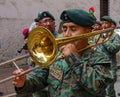 cuenca, Ecuador, Dec 24, 2021 - Men plays trombone in the traditional Traveling Child Pase del Nino Christmas Eve Parade