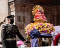 cuenca, Ecuador, Dec 24, 2021 - Miltary protects Baby Jesus statue in the traditional Traveling Child Pase del Nino