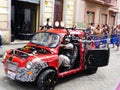 Vintage car covered with foam, carnival in Ecuador