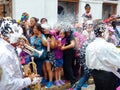 Cuenca, Ecuador. Foam is spraying during Carnival