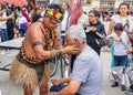 A shaman conducts an ancient ceremony of purification and healing. Ecuador