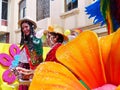 Cuenca, Ecuador. Parade during Carnival. Young woman and man dressed in ecuadorian national costume covered with foam