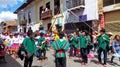 Cuenca, Ecuador. Dancers with ribbons during a parade Paseo del Nino Viajero Royalty Free Stock Photo