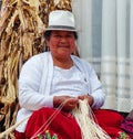 Indigenous woman weaving straw panama hat, Ecuador