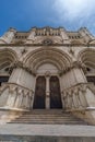 Front wide angle view of Cuenca Cathedral facade and main gate