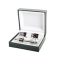 Cuff links in a box on white background Royalty Free Stock Photo