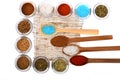 Cuisine and taste concept. Spoonfuls and jars of spices