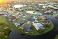 Cul de sac street dead end at sunset and private residential houses in rural suburban sprawl area in North Port, Florida Royalty Free Stock Photo