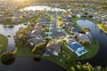 Cul de sac street dead end at sunset and private residential houses in rural suburban sprawl area in North Port, Florida Royalty Free Stock Photo