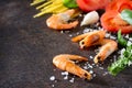 Culinary background for cooking with pasta, shrimps, tomatoes, fresh herbs and spices.