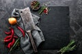 Culinary background with empty black slate board