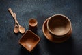 Culinary background : empty ceramic plates, wooden or bamboo spoons and bowls Royalty Free Stock Photo