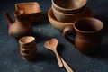 Culinary background : empty ceramic plates, wooden or bamboo spoons and bowls Royalty Free Stock Photo