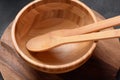 Culinary background, empty ceramic plates, wooden or bamboo spoons and bowls Royalty Free Stock Photo
