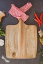 Culinary background with empty cutting board Royalty Free Stock Photo