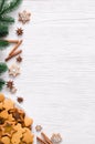 Culinary background with freshly baked Christmas gingerbread, spices and fir branches. Copy space Royalty Free Stock Photo