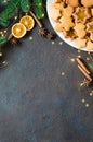 Culinary background with freshly baked Christmas gingerbread, spices and fir branches. Copy space Royalty Free Stock Photo