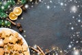 Culinary background with freshly baked Christmas gingerbread, spices and fir branches. Copy space Royalty Free Stock Photo