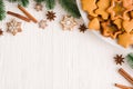 Culinary background with freshly baked Christmas gingerbread, spices and fir branches Royalty Free Stock Photo