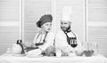 Culinary battle concept. Woman and bearded man culinary show competitors. Who cook better. Ultimate cooking challenge Royalty Free Stock Photo