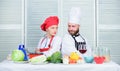 Culinary battle concept. Woman and bearded man culinary show competitors. Who cook better. Ultimate cooking challenge