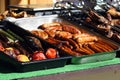 Culinary Buffet with healthy take away meal - grilled vegetables, fish and meat on the street food culinary market, festival, even