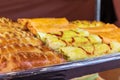 A culinary buffet with a presentation of various flour products.