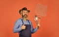 Culinary concept. summer weekend. happy hipster hold cooking utensils for barbecue. bearded man chef. Tools for roasting Royalty Free Stock Photo