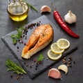 Culinary Crescendo: Grilled Salmon Steak's Serenade on a Glossy Stage Royalty Free Stock Photo