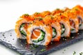 Culinary elegance Philadelphia rolls with salmon, cream cheese, cucumber tobiko Royalty Free Stock Photo