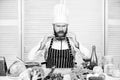 Culinary is exciting. Chef handsome hipster. Get ready. Man bearded chef getting ready cooking delicious dish. Chef at