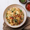 Culinary fusion Indonesian stir fry featuring bean sprouts and fried tofu