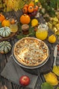 Culinary pastries, open pie with vegetables or fruits with pumpkins