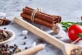 Culinary still life of assorted spices on white textured background, flat lay, close-up, shallow depth of field. Royalty Free Stock Photo