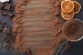 Aromatic cocoa powder scattered over black background