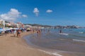 Cullera Spain tourists and visitors enjoying the beach and Mediterranean sea in the beautiful coast town