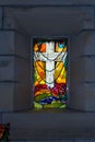 Christian cross in a stained glass window