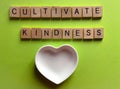 Cultivate Kindness, and ceramic heart shape