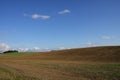 Cultivated field and wind turbine in Champagne Royalty Free Stock Photo